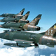 A formation of F-100D Super Sabres of the 118th Tactical Fighter Wing in Vietnam-era jungle camouflage in 1961 (US Air Force)